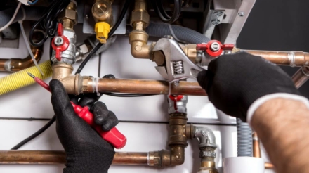 Expert plumber handling a natural gas replacement