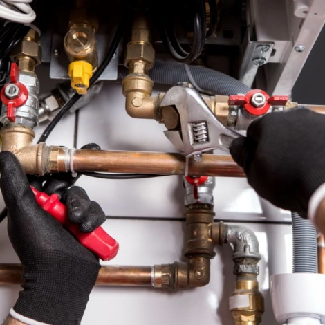 Expert plumber handling a natural gas replacement