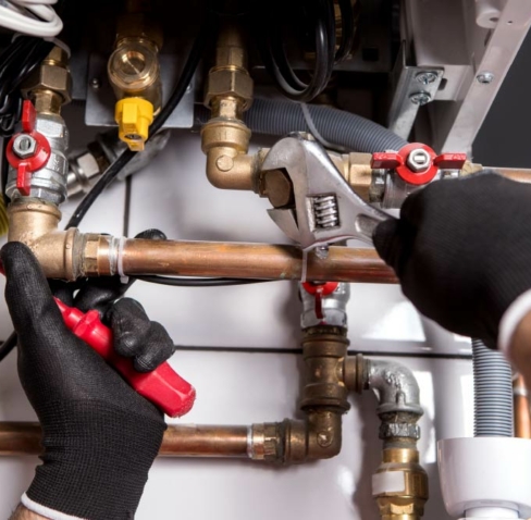 Expert plumber handling a natural gas replacement