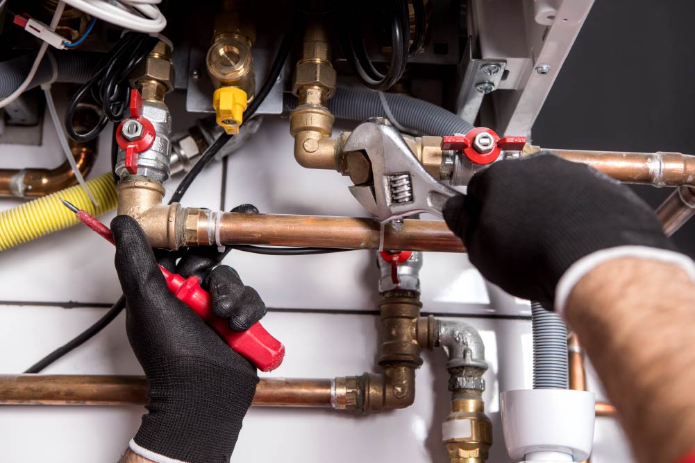 Expert plumber handling a natural gas replacement
